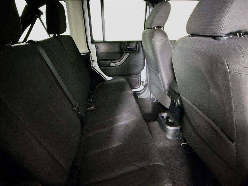 used 2018 Jeep Wrangler JK Unlimited car, priced at $19,497