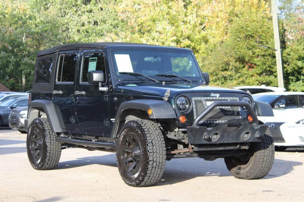 used 2012 Jeep Wrangler Unlimited car, priced at $12,895