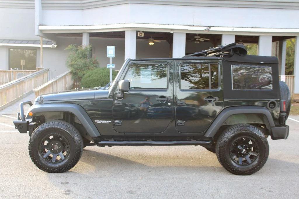 used 2012 Jeep Wrangler Unlimited car, priced at $12,895