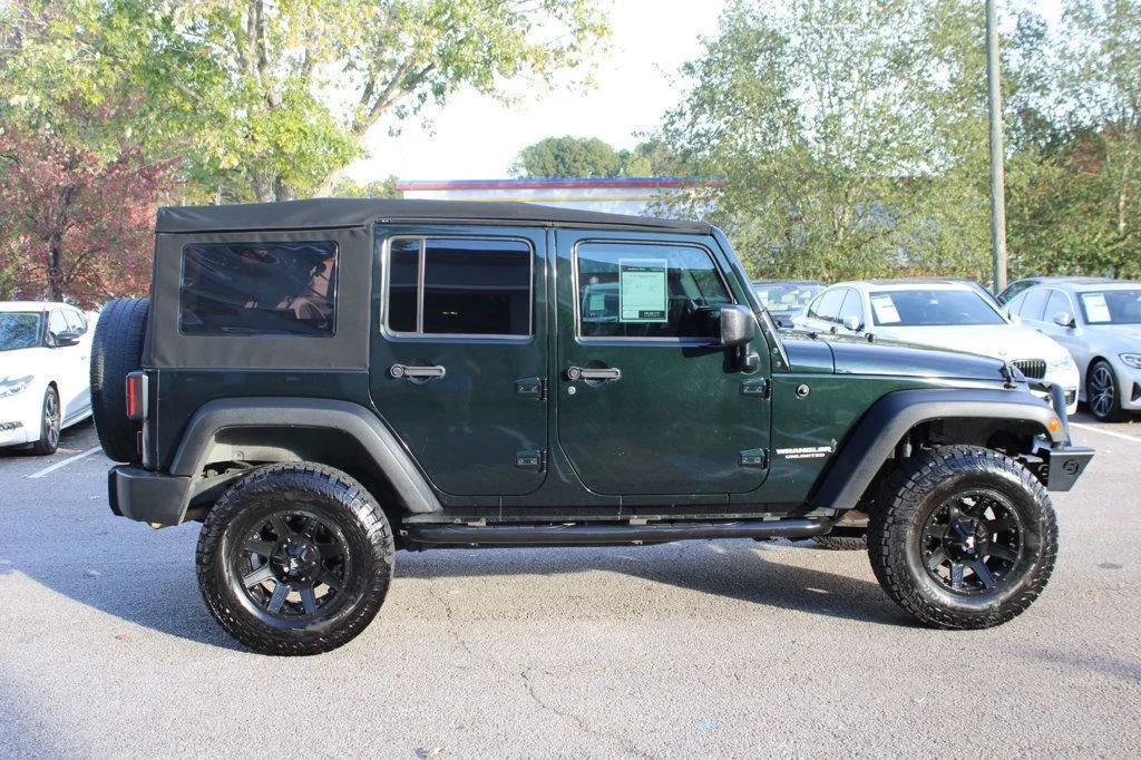 used 2012 Jeep Wrangler Unlimited car, priced at $12,895