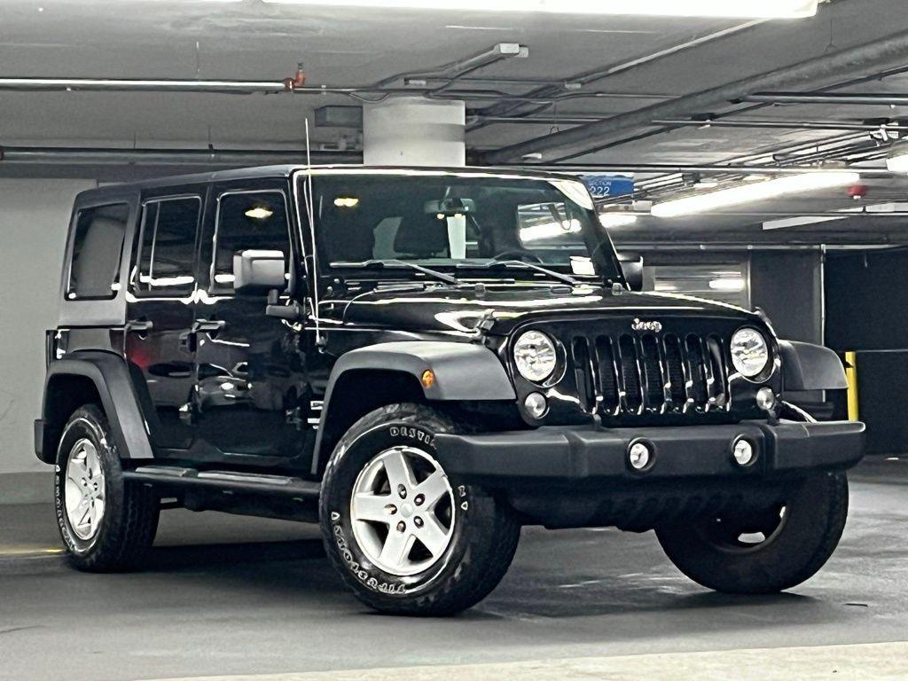 used 2015 Jeep Wrangler Unlimited car, priced at $12,912