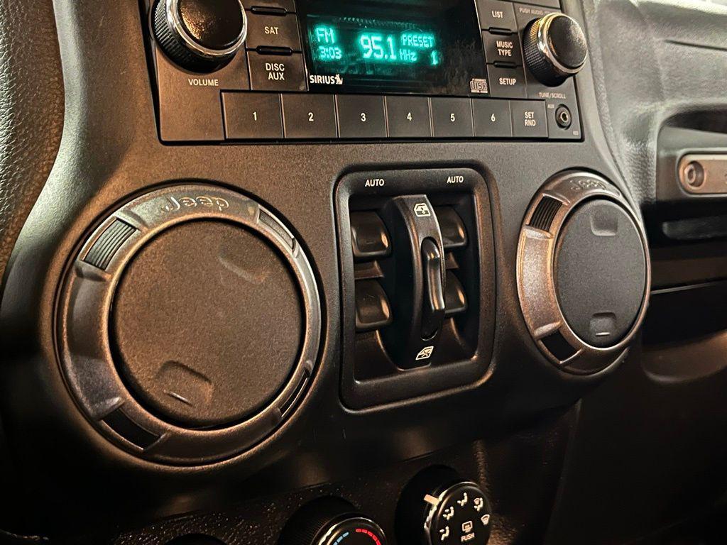 used 2015 Jeep Wrangler Unlimited car, priced at $12,912