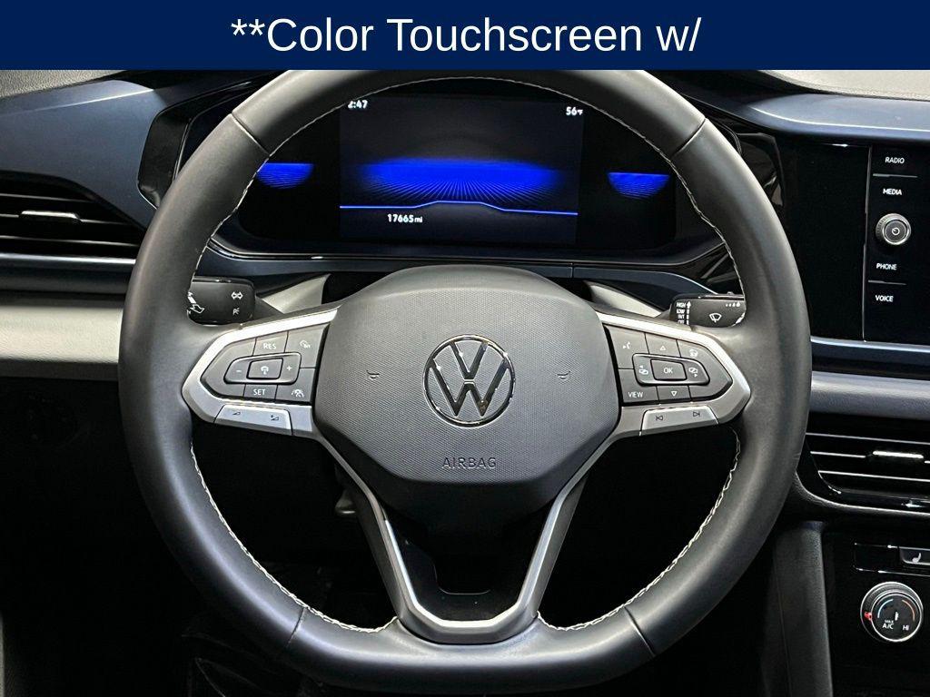 used 2023 Volkswagen Taos car, priced at $24,000