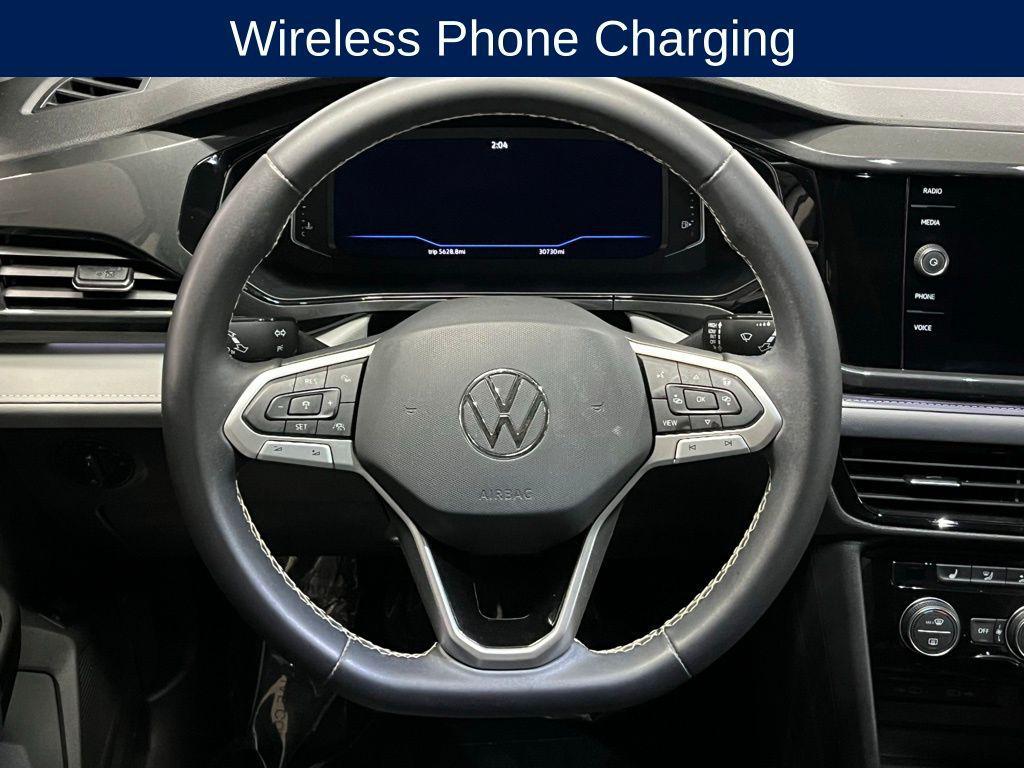 used 2023 Volkswagen Taos car, priced at $21,500