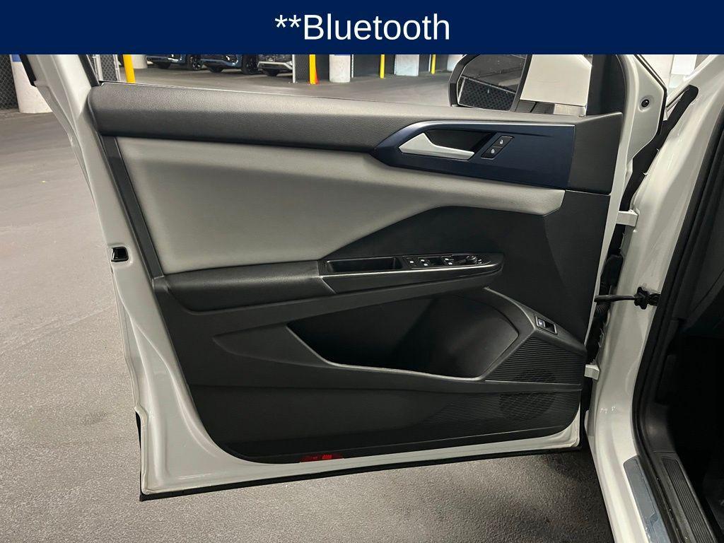 used 2023 Volkswagen Taos car, priced at $19,000