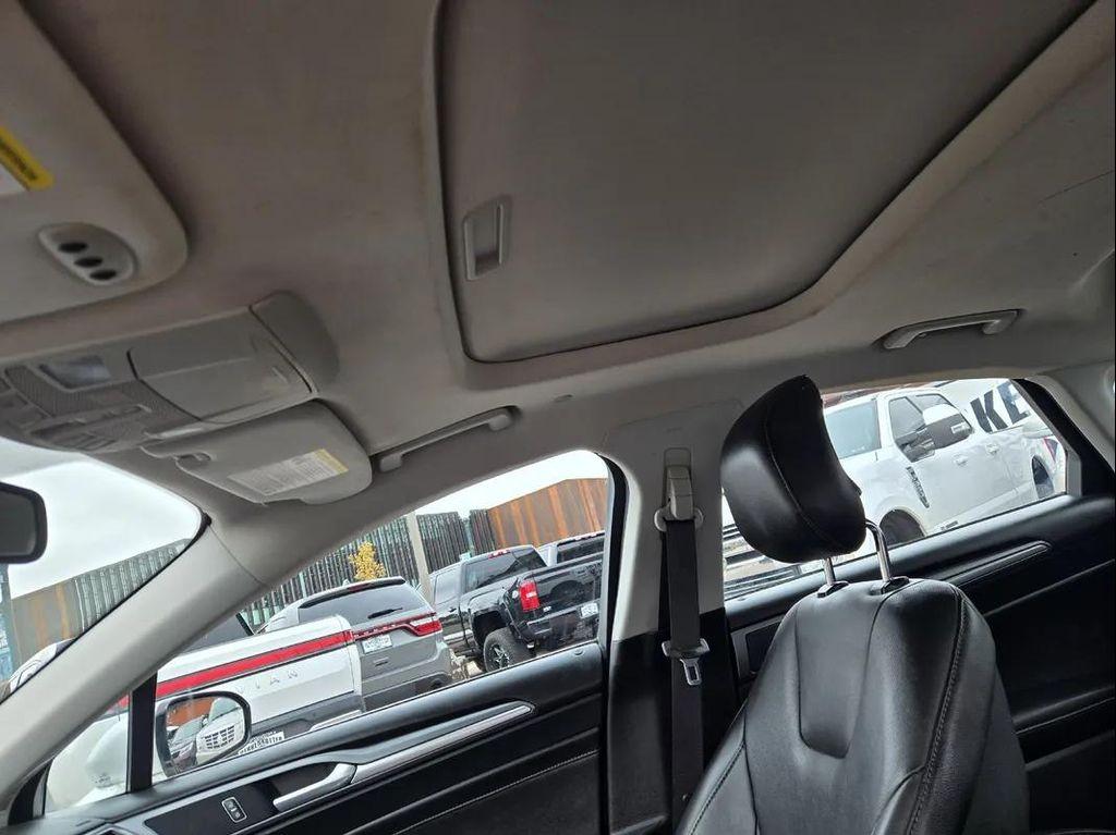 used 2013 Ford Fusion Energi car, priced at $6,000