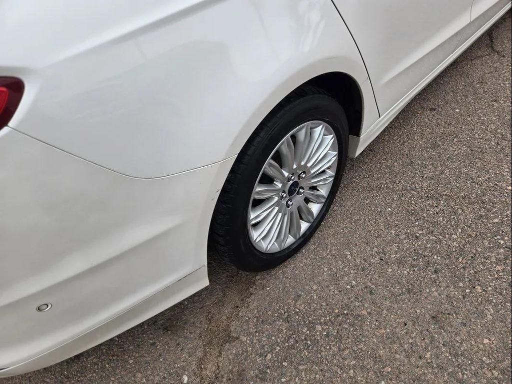 used 2013 Ford Fusion Energi car, priced at $6,000