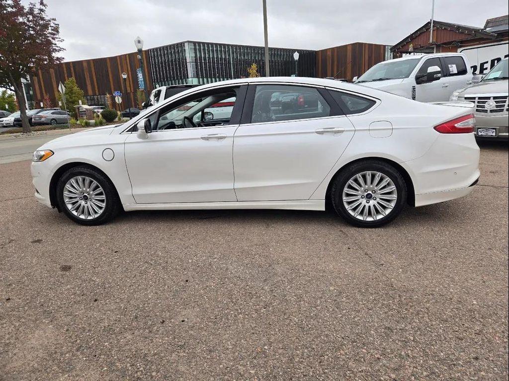 used 2013 Ford Fusion Energi car, priced at $6,000