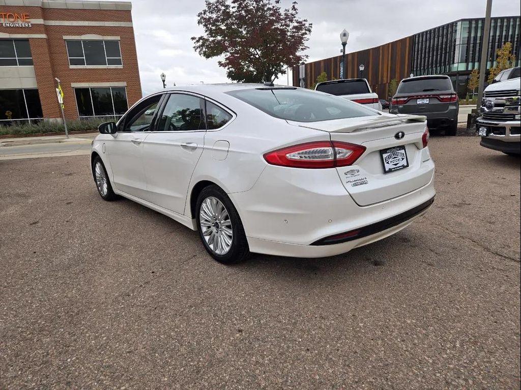 used 2013 Ford Fusion Energi car, priced at $6,000