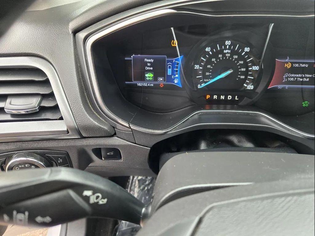 used 2013 Ford Fusion Energi car, priced at $6,000