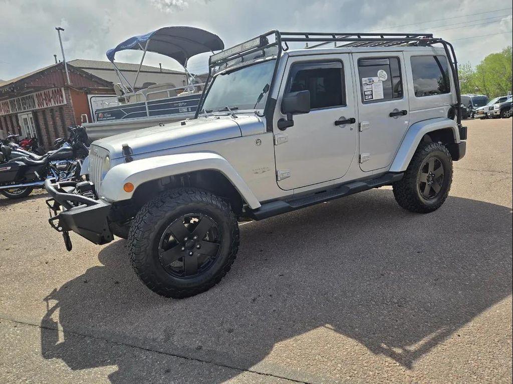 used 2012 Jeep Wrangler Unlimited car, priced at $13,995