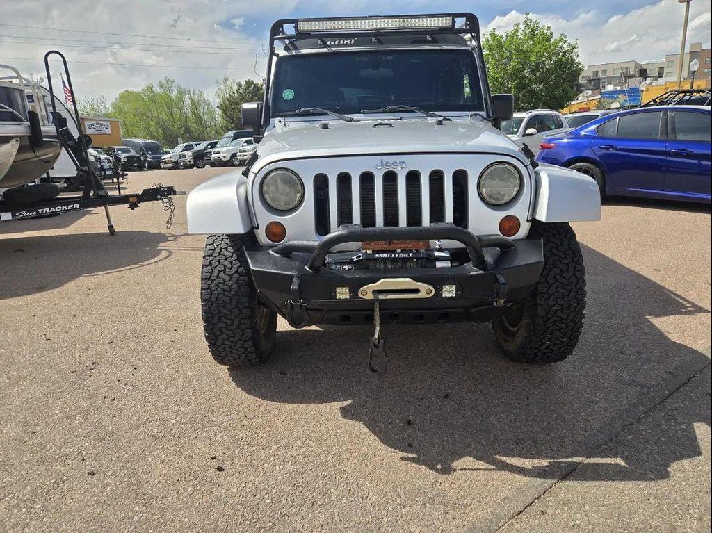 used 2012 Jeep Wrangler Unlimited car, priced at $13,995