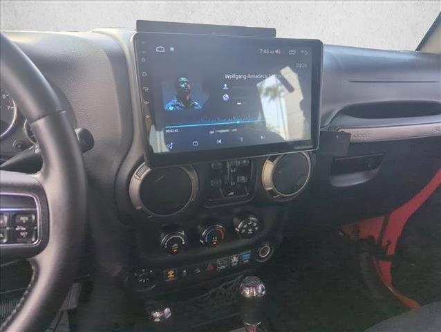 used 2016 Jeep Wrangler Unlimited car, priced at $16,991