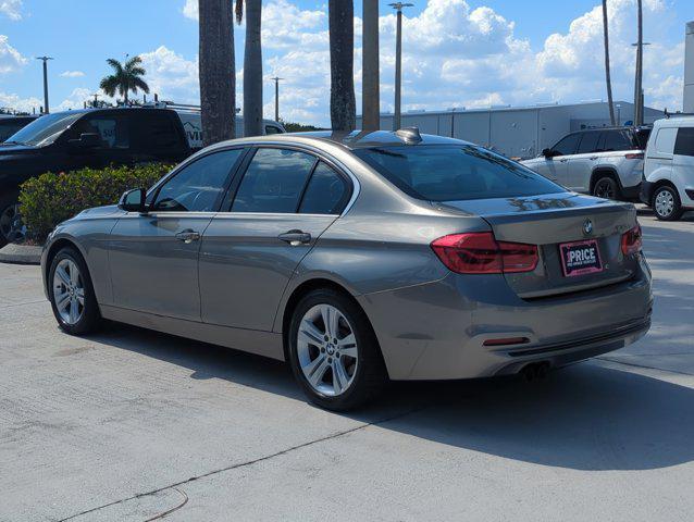 used 2018 BMW 330 car, priced at $20,291