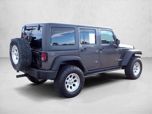 used 2016 Jeep Wrangler Unlimited car, priced at $16,953