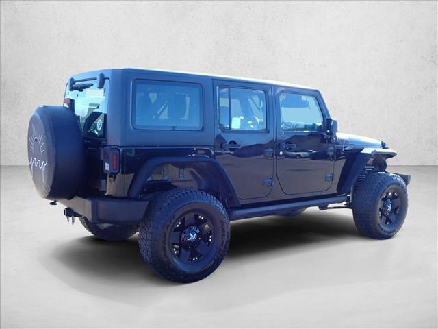 used 2013 Jeep Wrangler Unlimited car, priced at $15,299