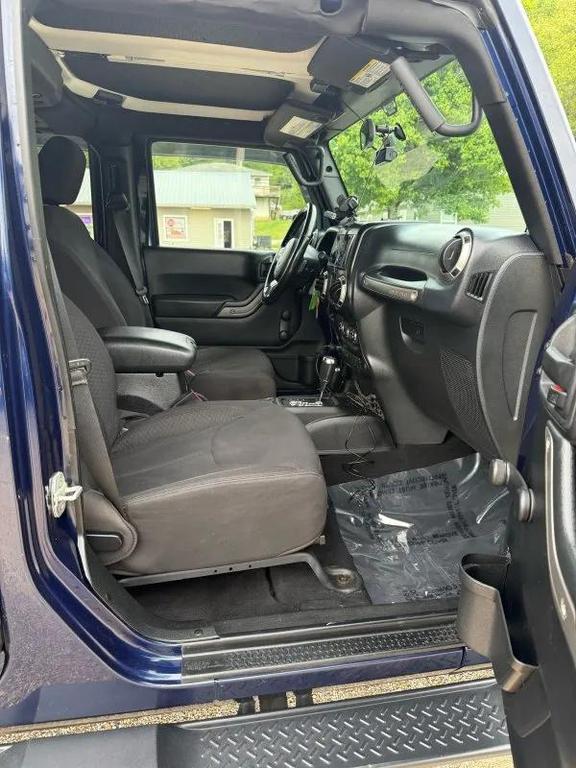 used 2013 Jeep Wrangler Unlimited car, priced at $13,995