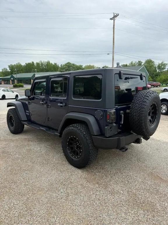 used 2013 Jeep Wrangler Unlimited car, priced at $13,995