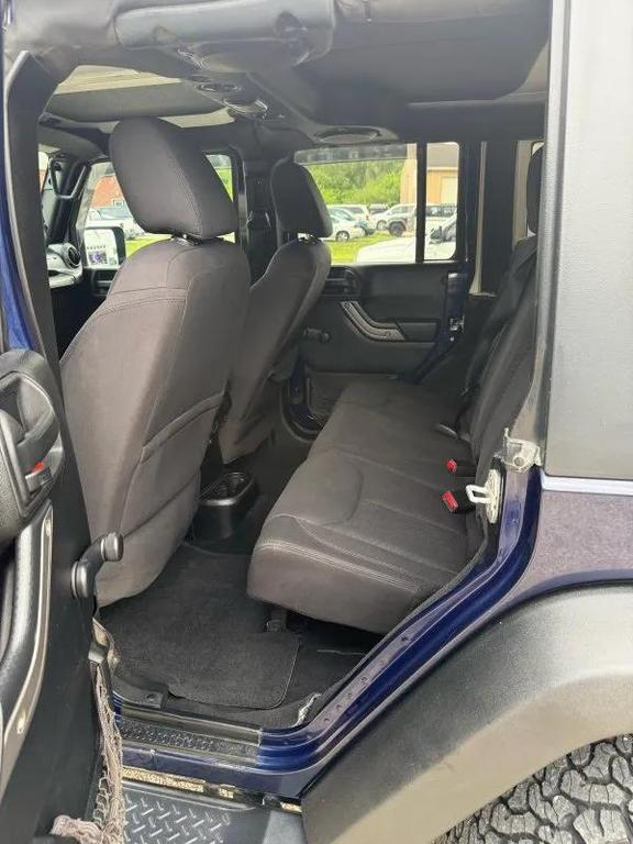 used 2013 Jeep Wrangler Unlimited car, priced at $13,995