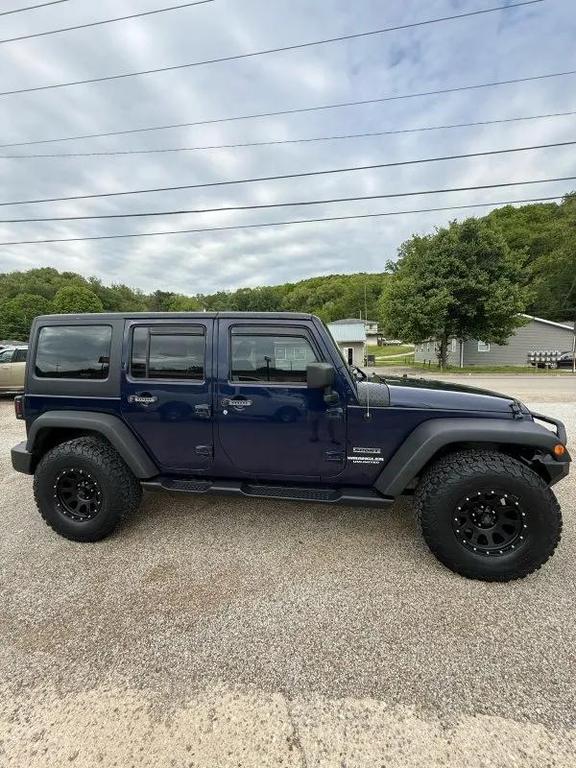 used 2013 Jeep Wrangler Unlimited car, priced at $13,995