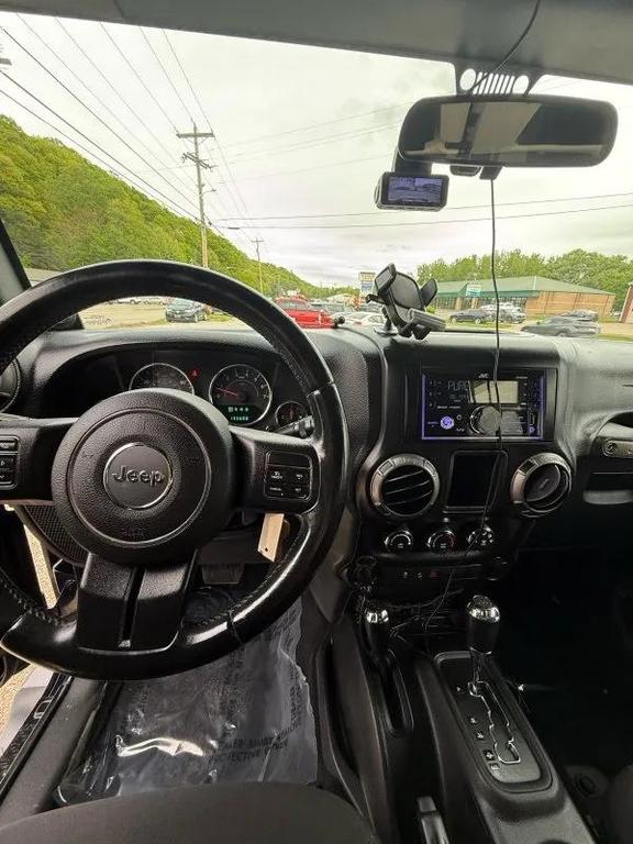 used 2013 Jeep Wrangler Unlimited car, priced at $13,995