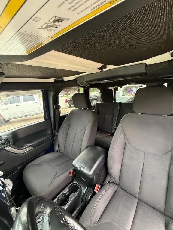 used 2013 Jeep Wrangler Unlimited car, priced at $13,995