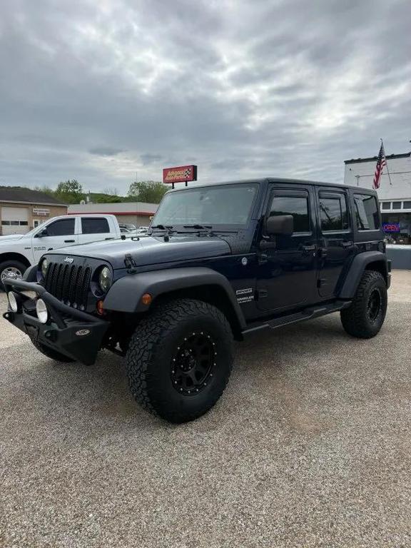 used 2013 Jeep Wrangler Unlimited car, priced at $13,995