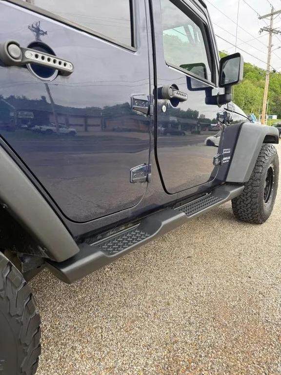 used 2013 Jeep Wrangler Unlimited car, priced at $13,995