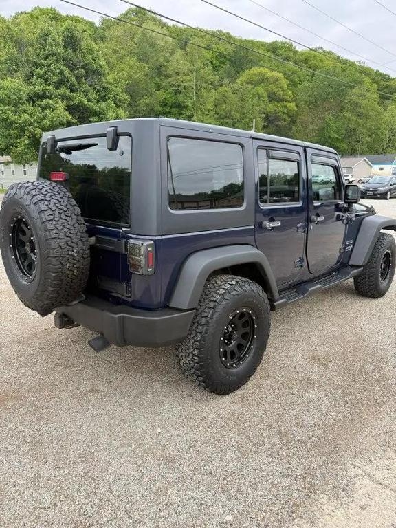 used 2013 Jeep Wrangler Unlimited car, priced at $13,995