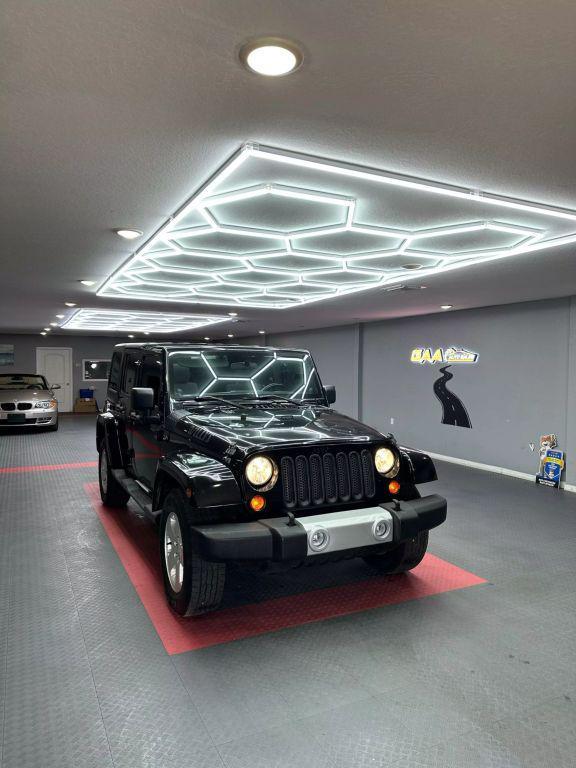 used 2012 Jeep Wrangler Unlimited car, priced at $12,849