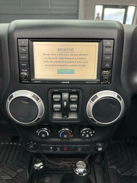 used 2012 Jeep Wrangler Unlimited car, priced at $12,849