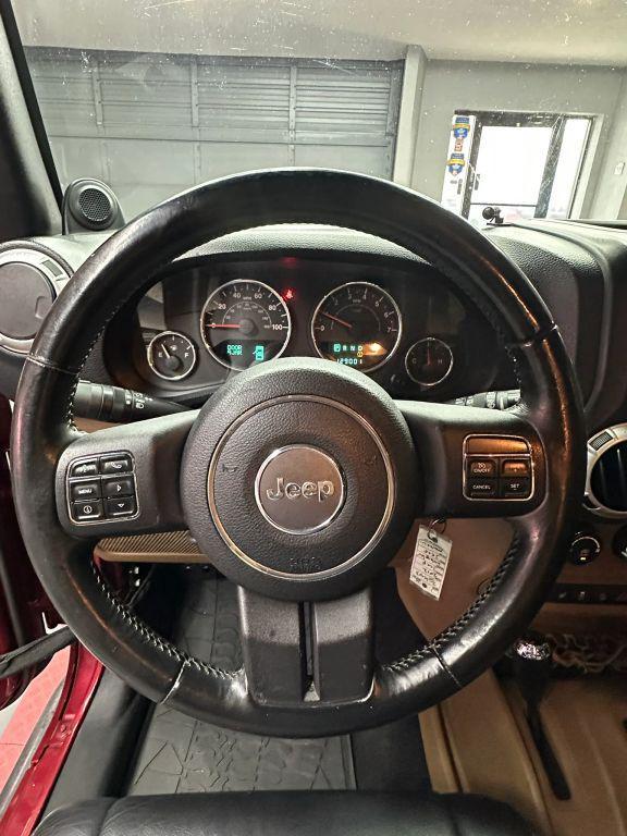 used 2012 Jeep Wrangler Unlimited car, priced at $14,989
