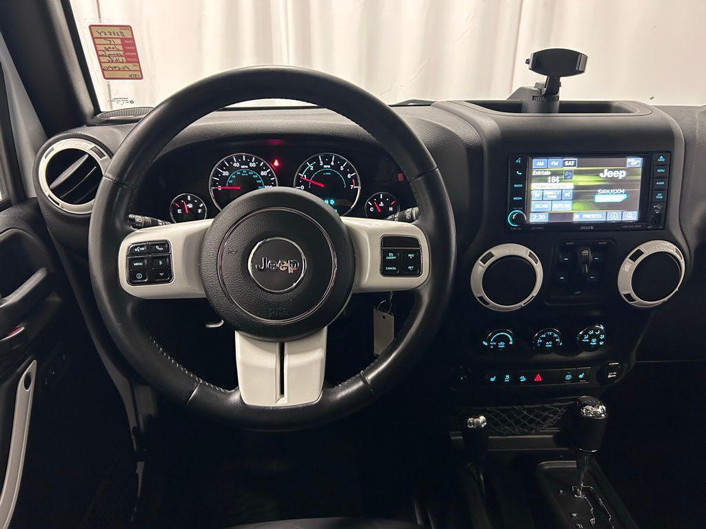 used 2015 Jeep Wrangler Unlimited car, priced at $15,990