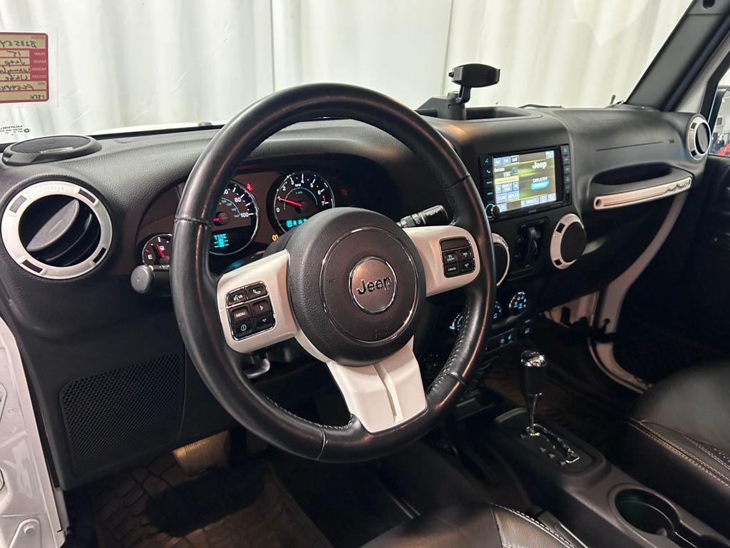 used 2015 Jeep Wrangler Unlimited car, priced at $15,990