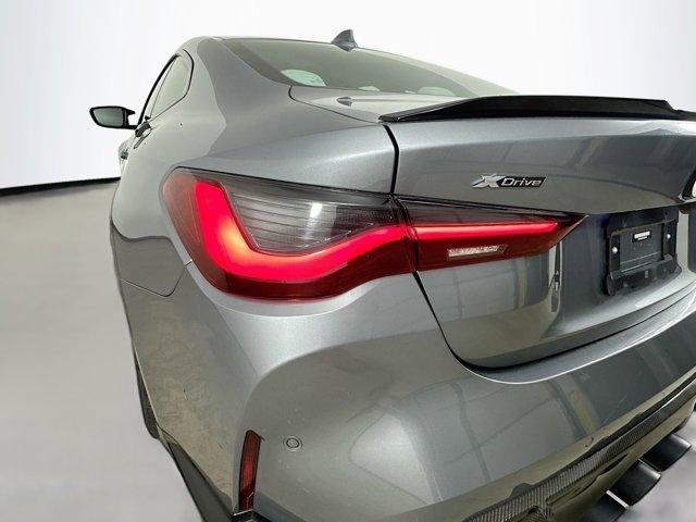 used 2023 BMW M4 car, priced at $77,122