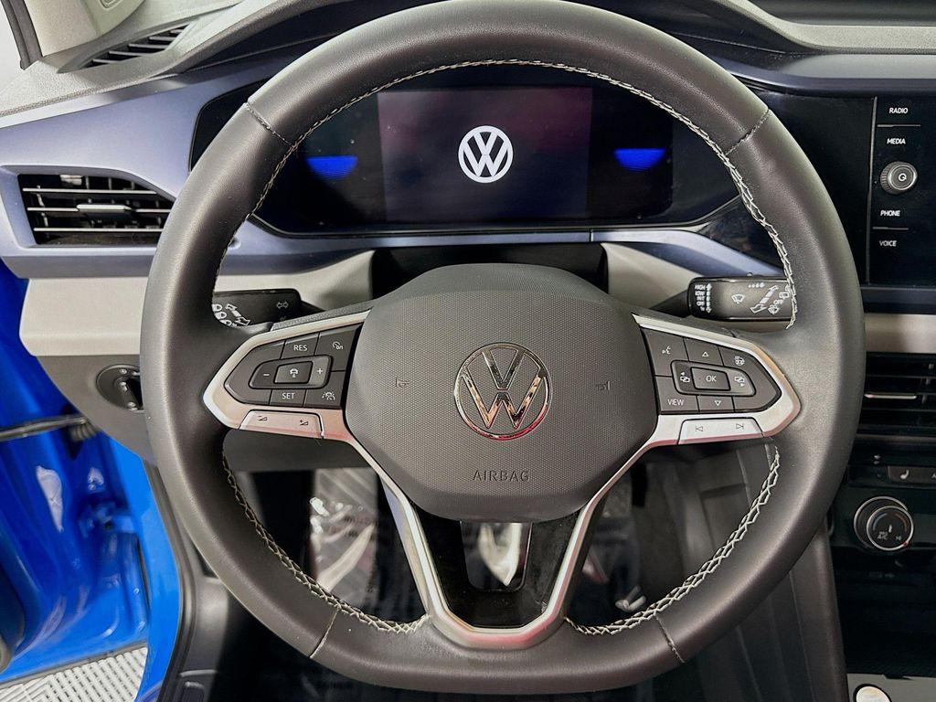 used 2023 Volkswagen Taos car, priced at $21,697