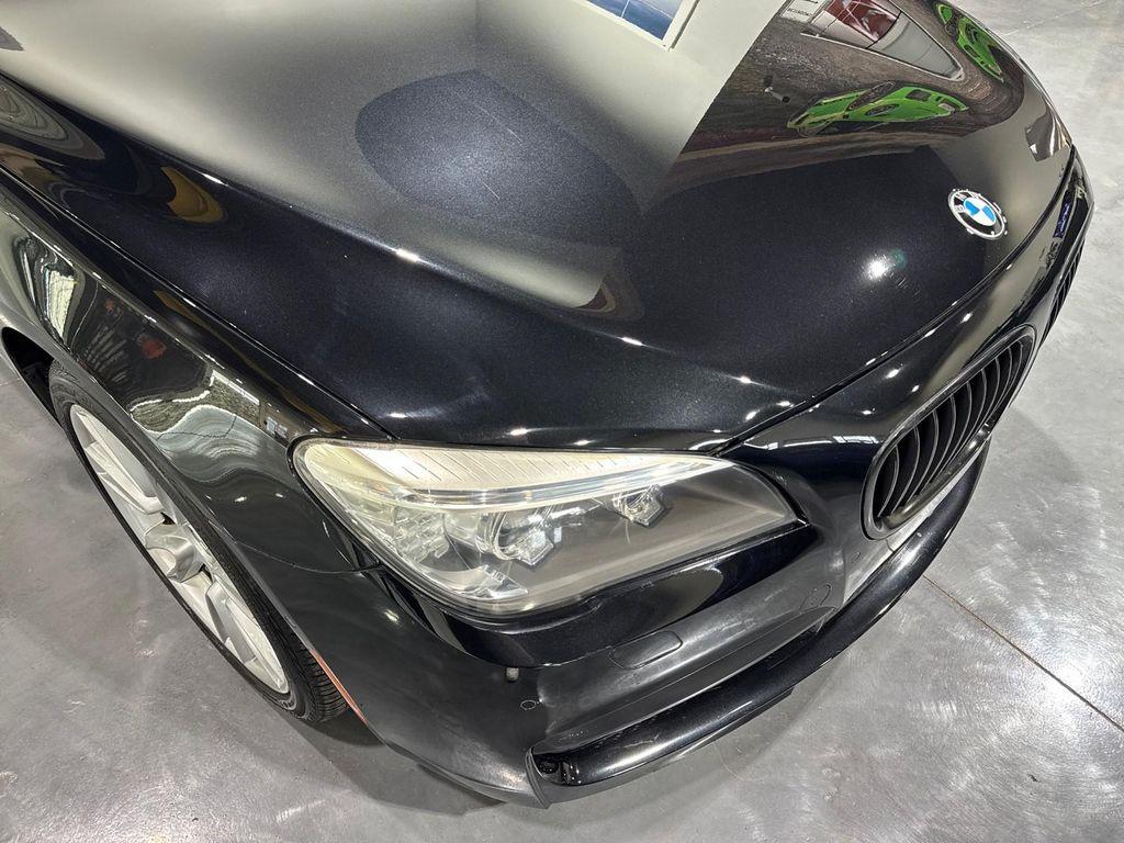 used 2015 BMW 740 car, priced at $14,995