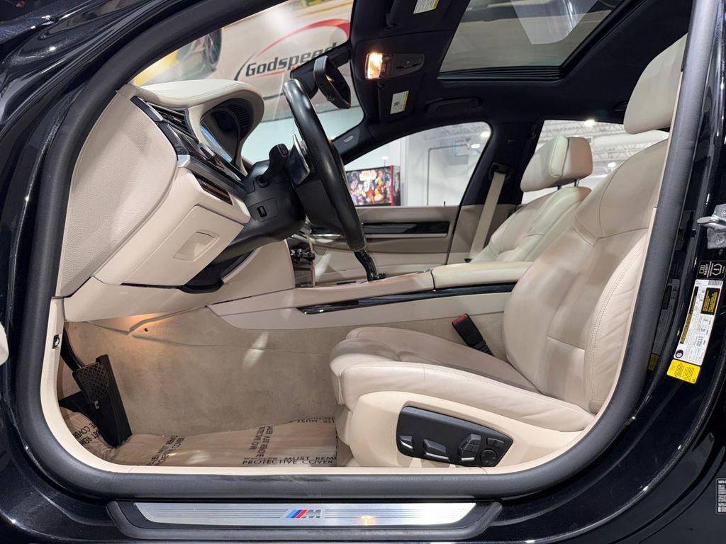 used 2014 BMW 750 car, priced at $15,995
