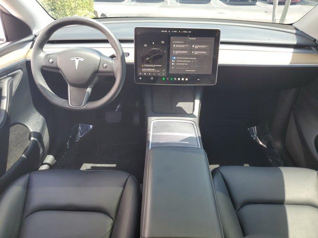 used 2024 Tesla Model Y car, priced at $40,243