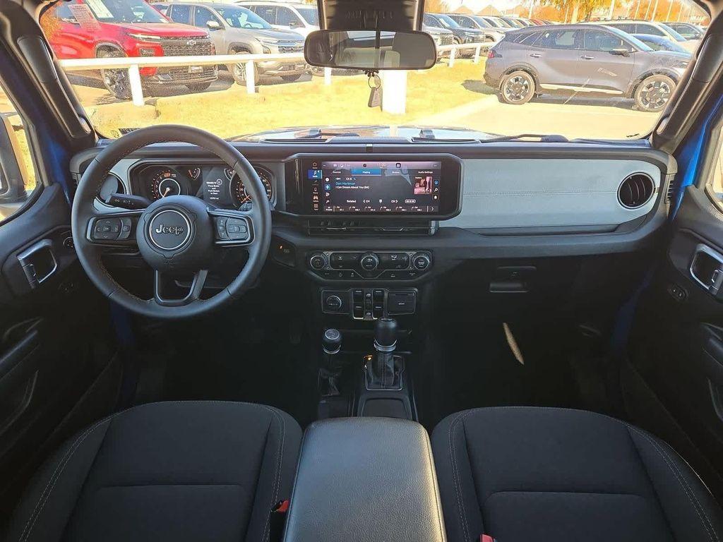used 2024 Jeep Wrangler car, priced at $33,996