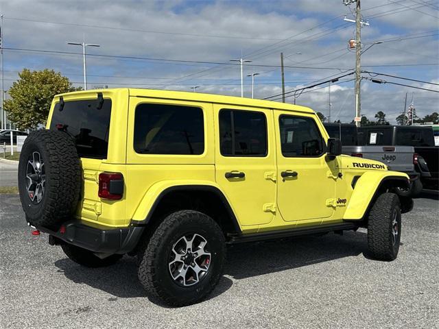 used 2022 Jeep Wrangler Unlimited car, priced at $37,852