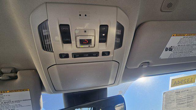 used 2023 Toyota Highlander Hybrid car, priced at $34,133