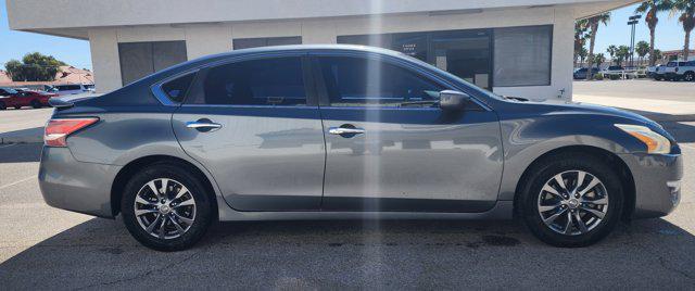 used 2015 Nissan Altima car, priced at $12,999