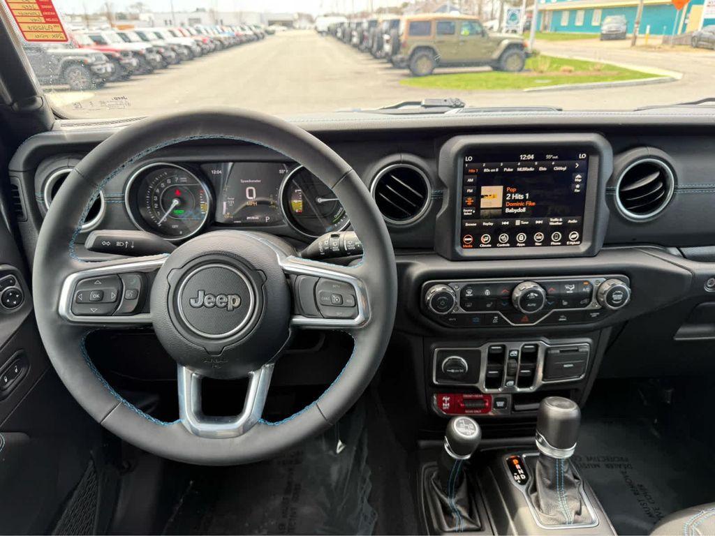 used 2023 Jeep Wrangler 4xe car, priced at $33,675