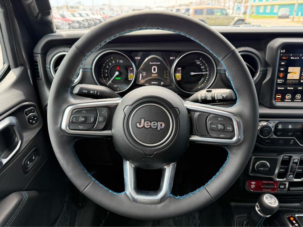 used 2023 Jeep Wrangler 4xe car, priced at $33,675