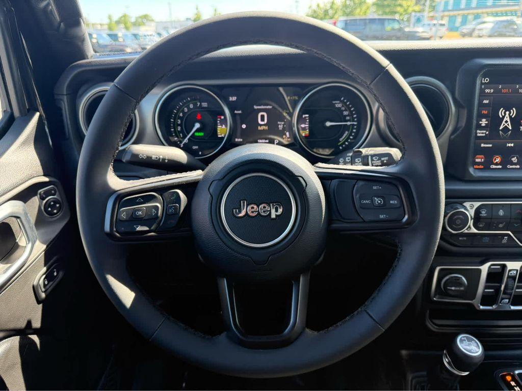 used 2023 Jeep Wrangler 4xe car, priced at $33,269