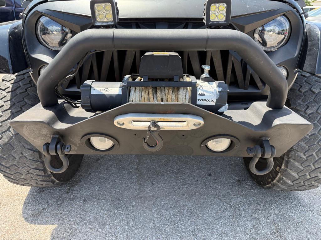 used 2015 Jeep Wrangler Unlimited car, priced at $17,350