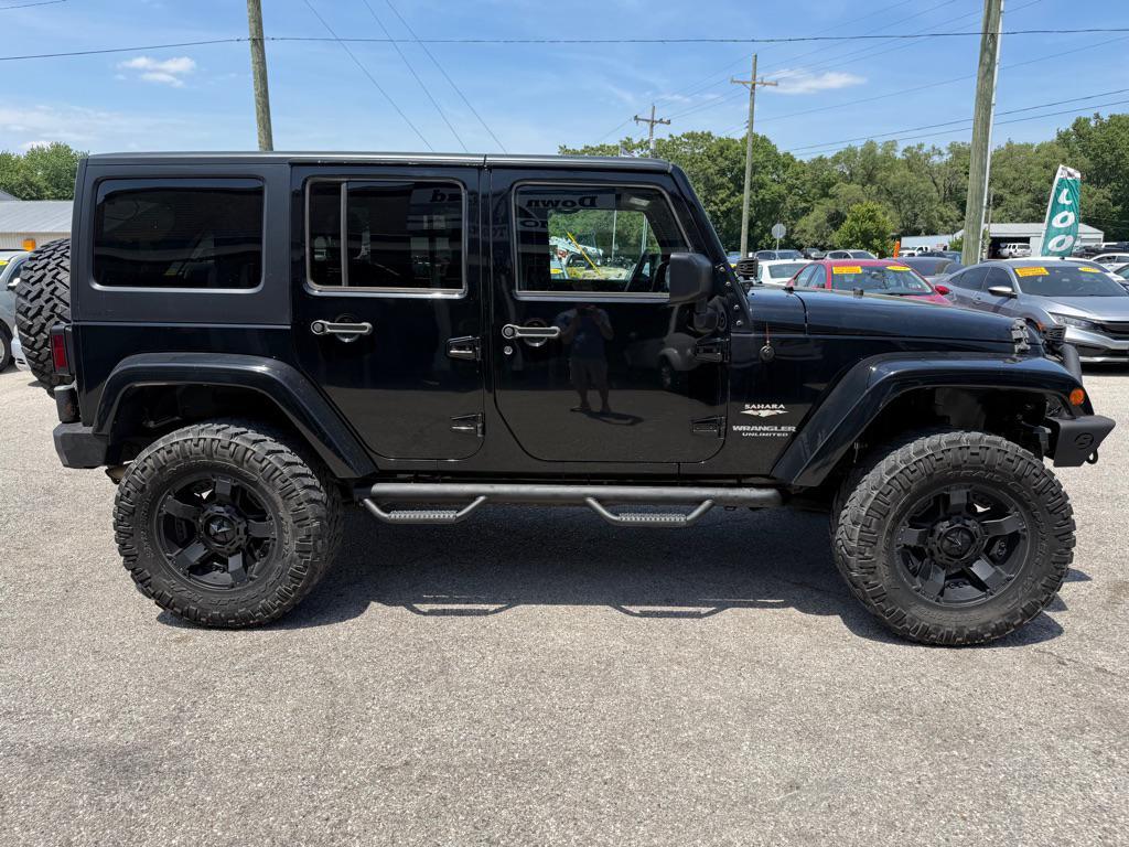 used 2015 Jeep Wrangler Unlimited car, priced at $17,350