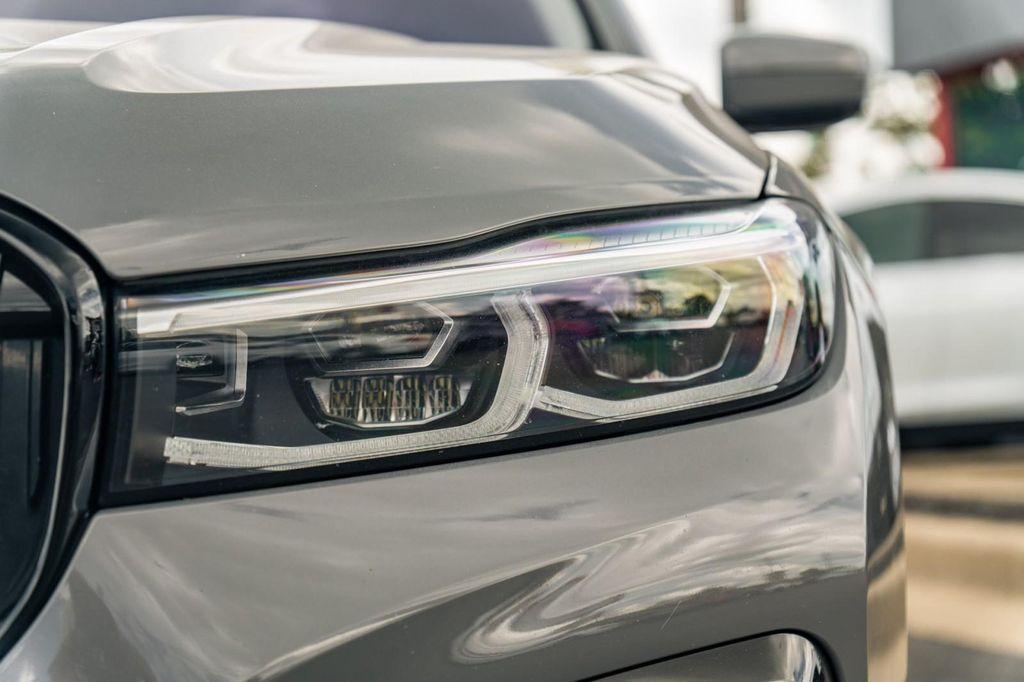 used 2022 BMW M760 car, priced at $77,900