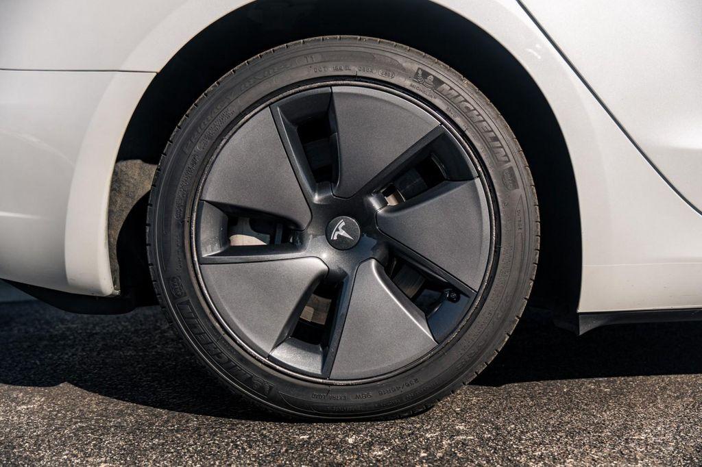 used 2023 Tesla Model 3 car, priced at $23,700